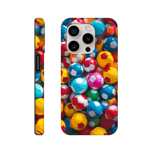 An iPhone 15 Pro Phone Case with the following design on it: A Kids ball pit made up of soccer balls, the soccer balls are of a variety of colors, fun and bright, pop art