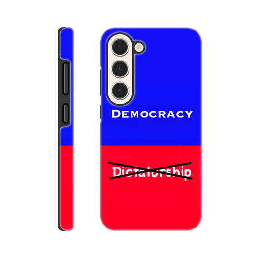 A Samsung Galaxy S23 Phone Case with the following design on it : A visual comparison of two posters, the one on top features the term "Democracy”; written in white, against a royal blue background, and the one of the bottom features the term “Dictatorship" which is also written in white but is crossed out by two black lines, highlighting the preference for Democracy. 